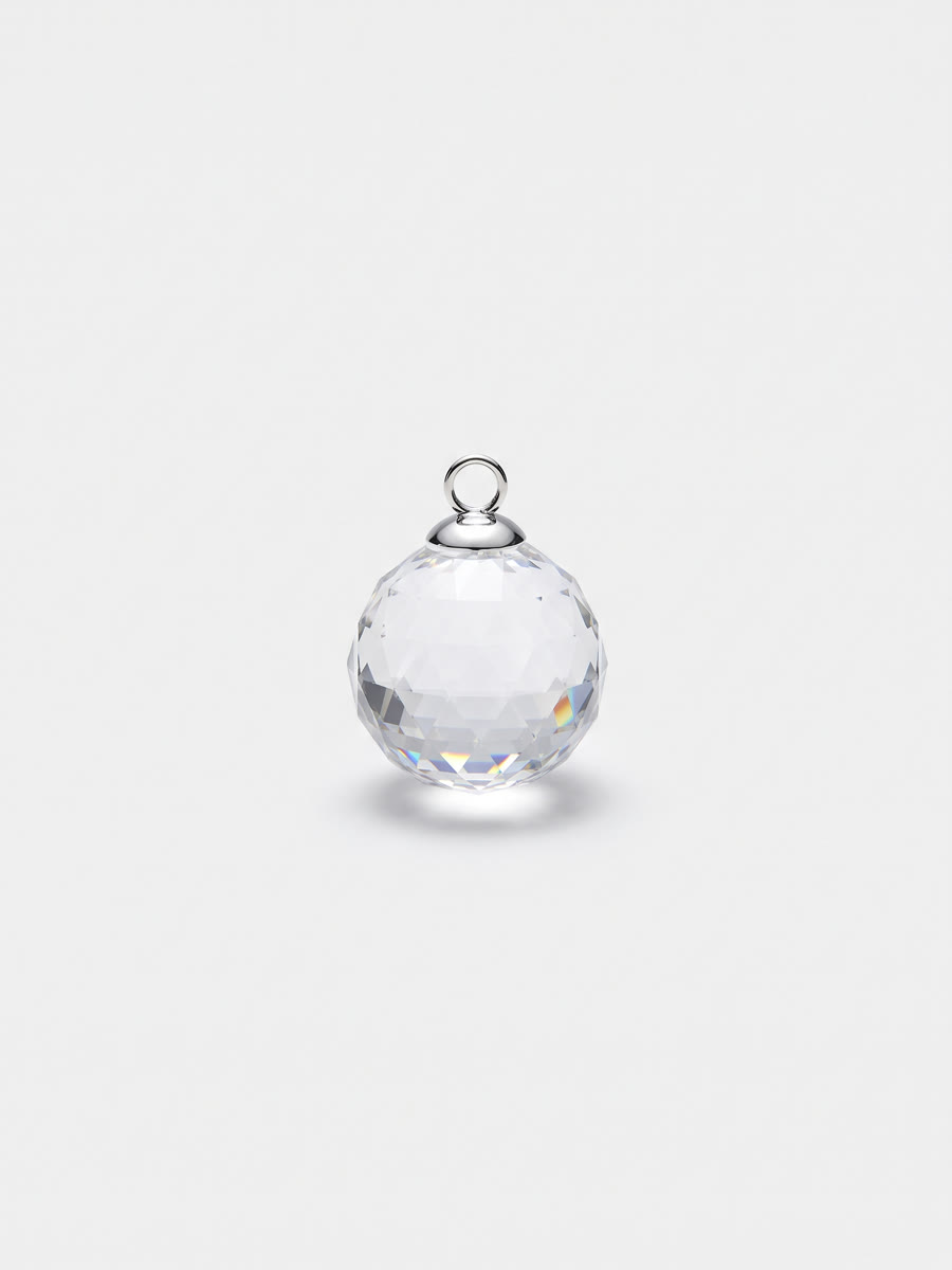 Faceted crystal sphere ornament with a silver cap