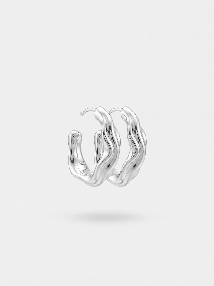 Sculptural molten silver hoop earrings