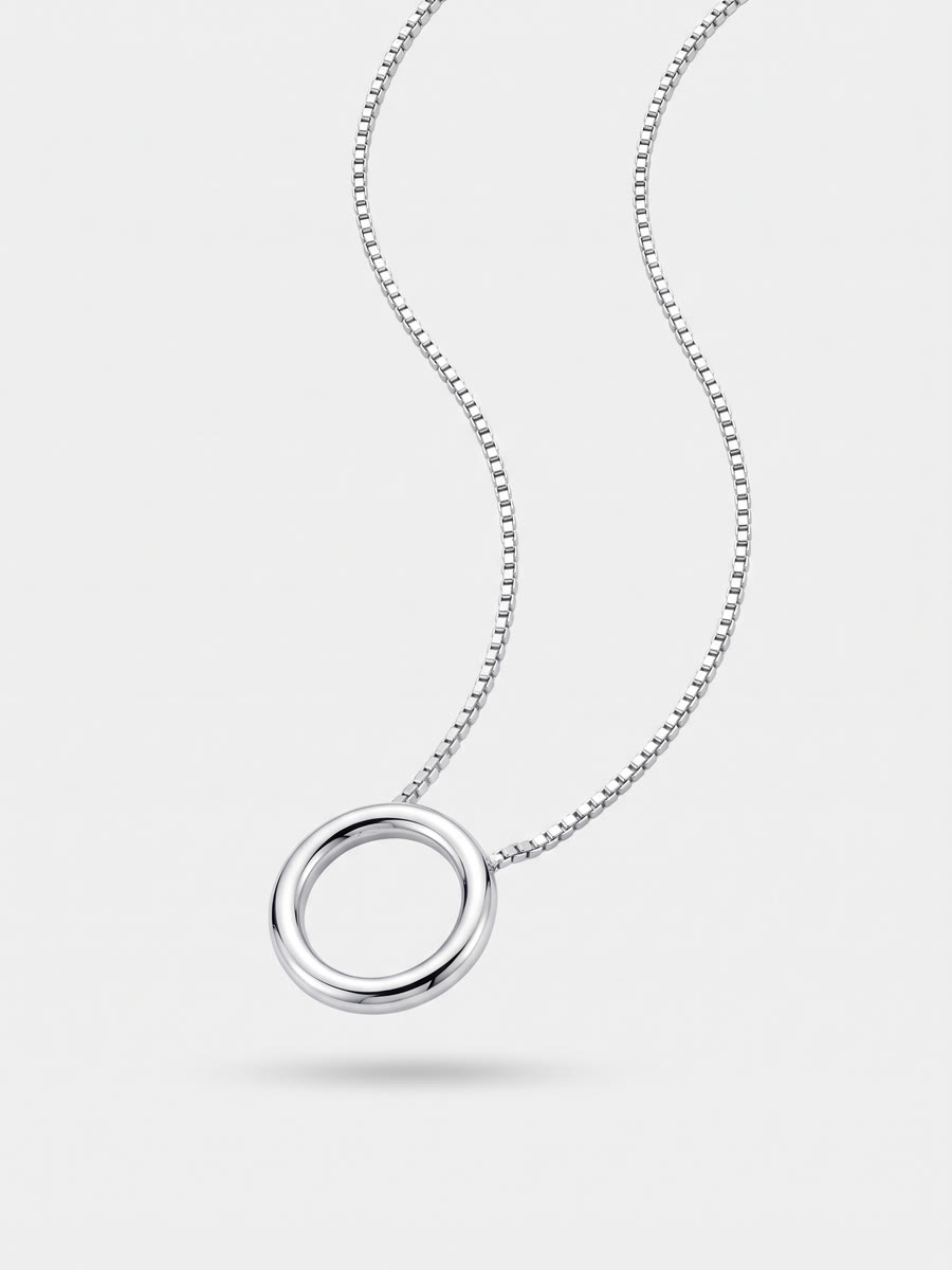 Silver necklace with an open circle pendant