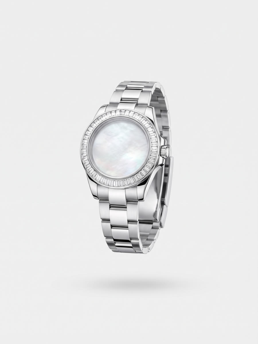 Silver watch with a baguette crystal bezel and pearl dial